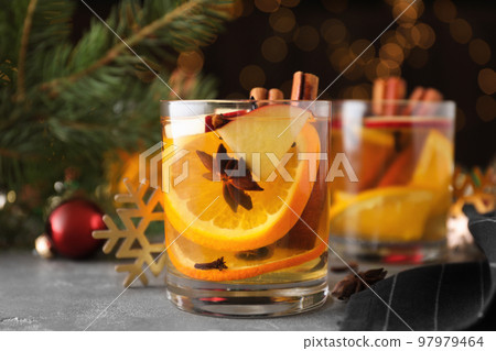 Aromatic white mulled wine on light grey table 97979464