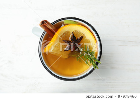 Aromatic white mulled wine on wooden table, top view Aromatic white mulled wine on wooden table, top view 97979466