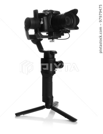 Modern professional video camera isolated on white 97979475