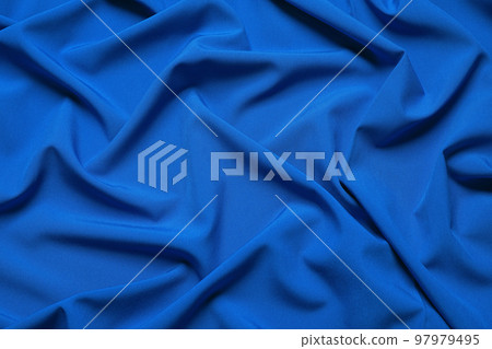 Crumpled fabric, top view. Color of the year 2020 (Classic blue) Crumpled fabric, top view. Color of the year 2020 (Classic blue) 97979495