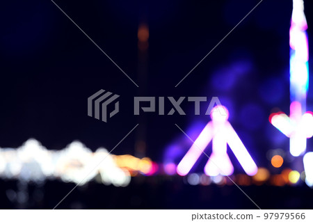 Blurred view of city street with festive lights at night. Bokeh effect Blurred view of city street with festive lights at night. Bokeh effect 97979566