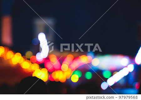 Blurred view of city street with festive lights at night. Bokeh effect Blurred view of city street with festive lights at night. Bokeh effect 97979568