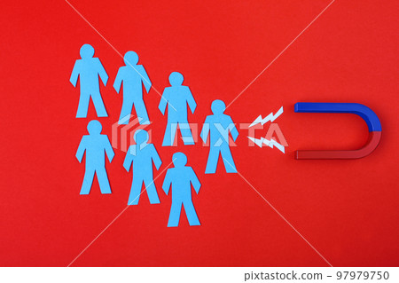 Magnet and paper people on crimson background, flat lay Magnet and paper people on crimson background, flat lay 97979750