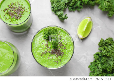 Tasty kale smoothie on light grey marble table, flat lay 97979844
