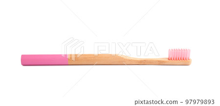 Bamboo toothbrush with pink bristle isolated on white 97979893