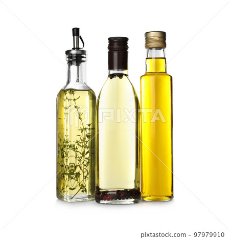Different sorts of cooking oil in bottles isolated on white Different sorts of cooking oil in bottles isolated on white 97979910
