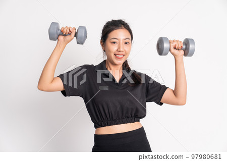 close up of beautiful woman lifting dumbbells exercising shoulder muscles close up of beautiful woman lifting dumbbells exercising shoulder muscles 97980681