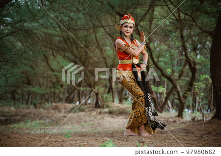 women presenting traditional Javanese dance movements women presenting traditional Javanese dance movements 97980682
