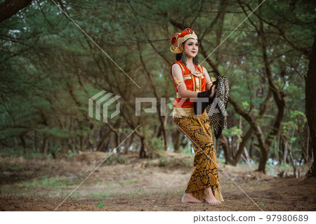 women presenting traditional Javanese dance movements women presenting traditional Javanese dance movements 97980689