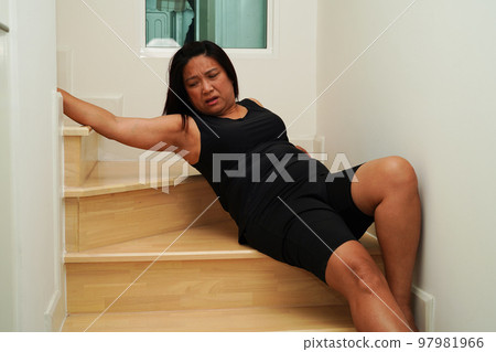 Asian lady woman injury from falling down on - Stock Photo [97981966] -  PIXTA