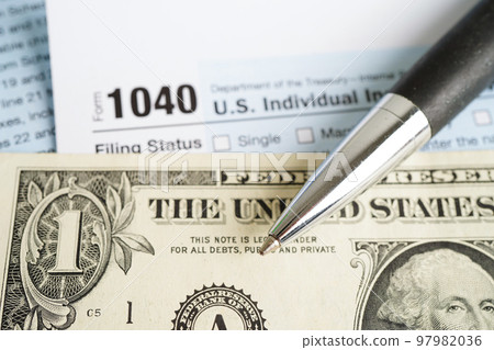 Tax form 1040 U.S. Individual Income Tax Return, business finance concept. Tax form 1040 U.S. Individual Income Tax Return, business finance concept. 97982036