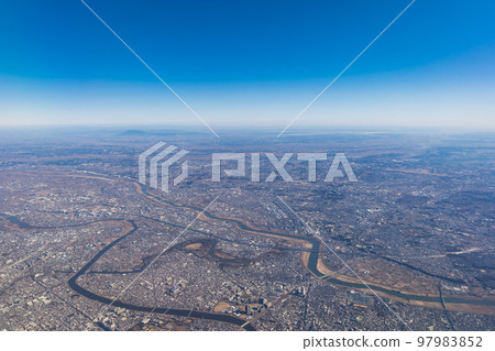 Winter scenery seen from inside the plane Winter scenery seen from inside the plane 97983852
