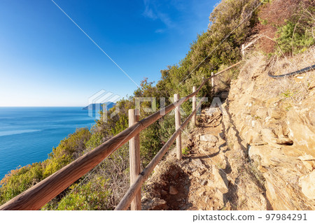 Hiking path near touristic town, Riomaggiore, Italy. Cinque Terre Hiking path near touristic town, Riomaggiore, Italy. Cinque Terre 97984291