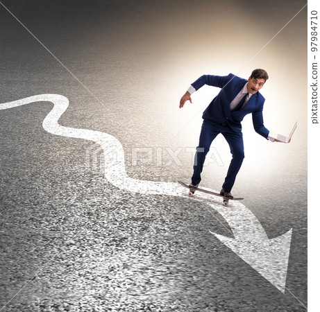 Businessman riding skateboard on financial graph Businessman riding skateboard on financial graph 97984710