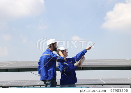 engineer working at solar farm engineer working at solar farm 97985206