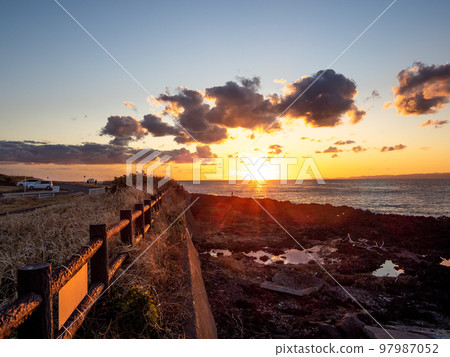 Sunset seen from Mandachihama on the Sunset Palm Line of Izu Oshima (Oshima Town, Tokyo) 97987052