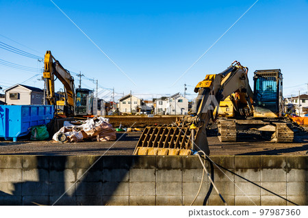 Construction site heavy equipment power shovel Construction site heavy equipment power shovel 97987360