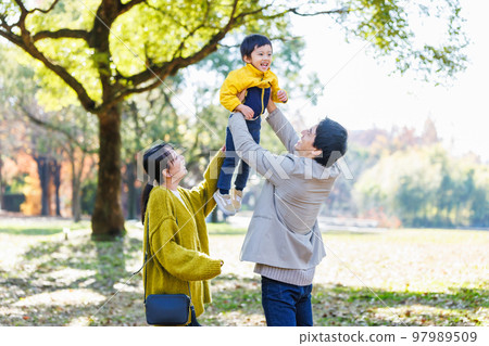 Image of a happy family spending time in the park 97989509