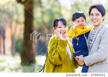 Image of a happy family spending time in the park 97989922