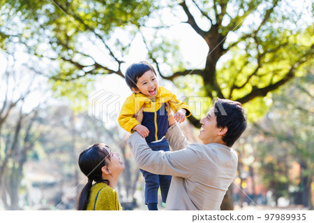 Image of a happy family spending time in the park 97989935