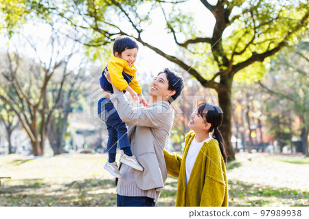 Image of a happy family spending time in the park 97989938