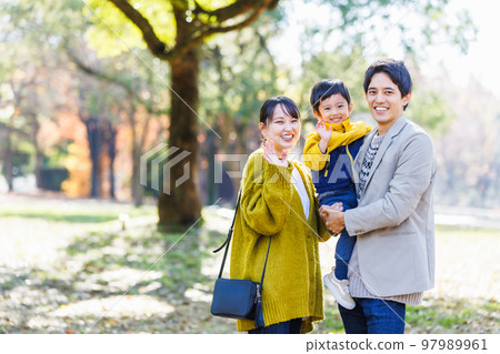 Image of a happy family spending time in the park 97989961