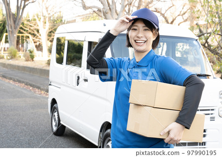 Courier female staff delivering packages Courier female staff delivering packages 97990195
