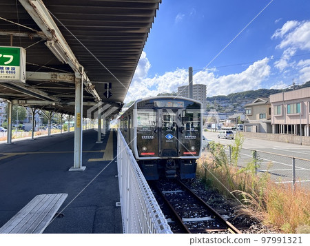 JR Kyushu Wakamatsu station and 819 series train JR Kyushu Wakamatsu station and 819 series train 97991321