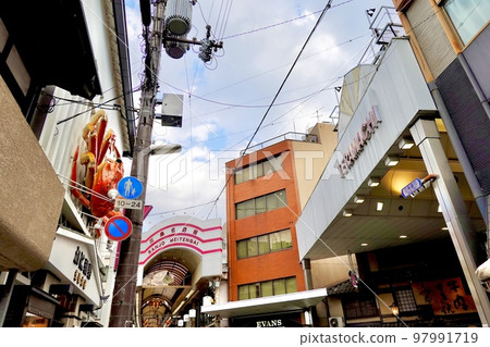 The crab sign seen from Teramachi Sanjo and the arcade sign of the Teramachi Kyogoku shopping street and Sanjo famous store street, Nakagyo Ward, Kyoto City The crab sign seen from Teramachi Sanjo and the arcade sign of the Teramachi Kyogoku shopping street and Sanjo famous store street, Nakagyo Ward, Kyoto City 97991719