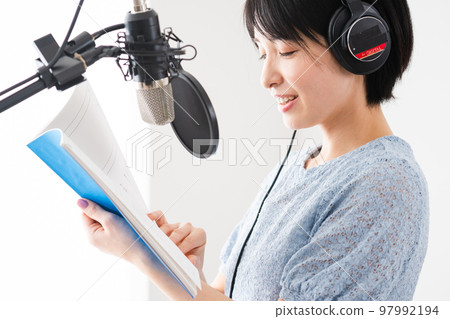 Young woman doing dubbing Narrator image 97992194