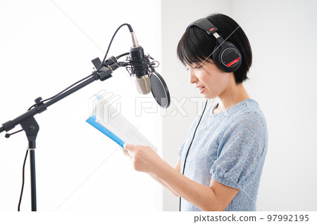 Young woman doing dubbing Narrator image Young woman doing dubbing Narrator image 97992195