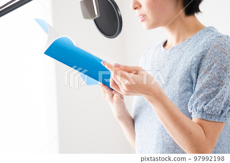 Young woman doing dubbing Voice actor image 97992198