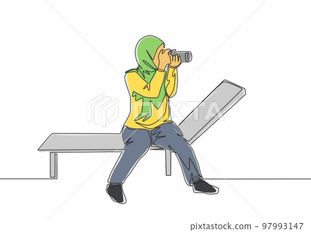 One continuous line drawing of young pretty happy muslimah with veil sitting on chair with camera. Beautiful Asian woman in trendy hijab fashion concept single line draw design vector illustration 97993147