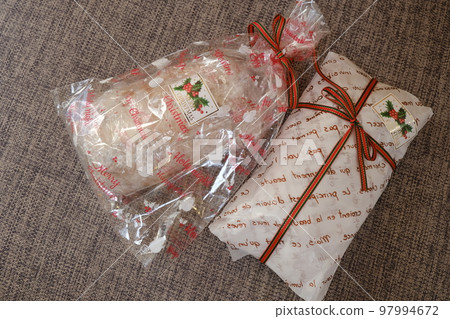 Stollen wrapped in red ribbon 97994672