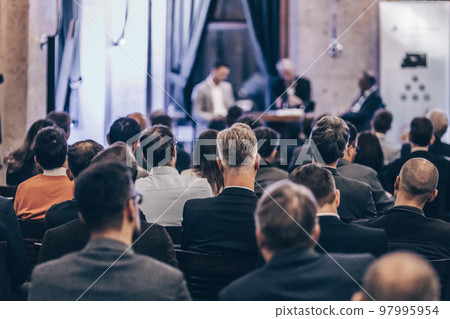 Round table discussion at business convention and Presentation. Audience at the conference hall. Business and entrepreneurship symposium. 97995954