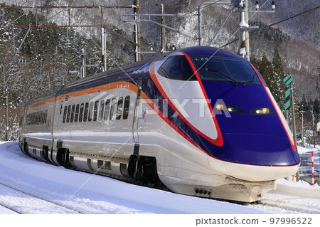 Yamagata Shinkansen crossing Itaya Pass in winter 97996522