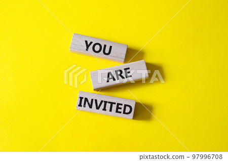 You are invited symbol. Wooden blocks with words You are invited. Beautiful yellow background. Business and You are invited concept. Copy space. You are invited symbol. Wooden blocks with words You are invited. Beautiful yellow background. Business and You are invited concept. Copy space. 97996708