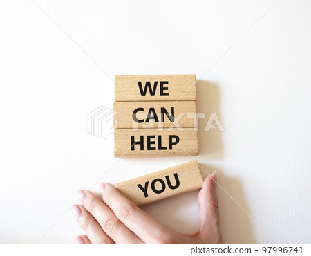 We can help you symbol. Concept words We can help you on wooden blocks. Beautiful white background. Businessman hand. Business and We can help you concept. Copy space We can help you symbol. Concept words We can help you on wooden blocks. Beautiful white background. Businessman hand. Business and We can help you concept. Copy space 97996741