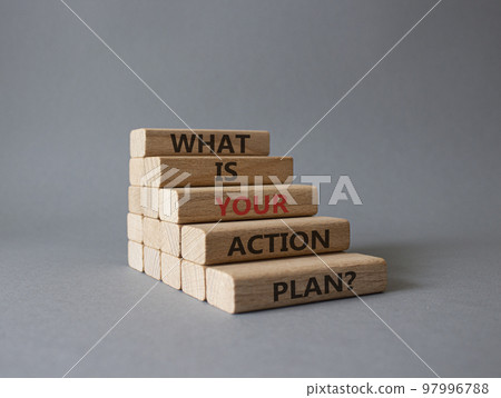 What is your action plan symbol. Wooden blocks with words What is your action plan. Beautiful yellow background. Business and What is your action plan concept. Copy space 97996788