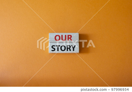 Our story symbol. Wooden blocks with words Our story Beautiful orange background. Business and Our story concept. Copy space. 97996934