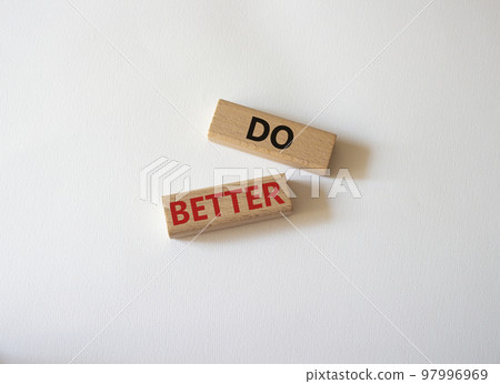 Do better symbol. Wooden blocks with words Do better. Beautiful white background. Business and Do better concept. Copy space. 97996969