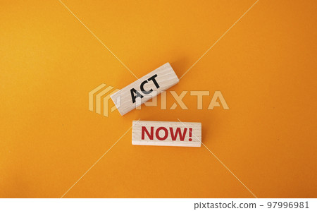 Act now symbol. Wooden blocks with words Act now. Beautiful orange background. Business and Act now concept. Copy space. Act now symbol. Wooden blocks with words Act now. Beautiful orange background. Business and Act now concept. Copy space. 97996981