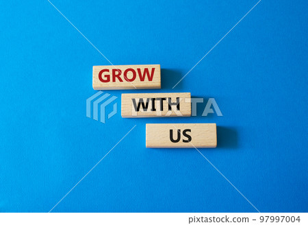 Grow with us symbol. Wooden blocks with words Grow with us. Beautiful blue background. Business and Grow with us concept. Copy space. Grow with us symbol. Wooden blocks with words Grow with us. Beautiful blue background. Business and Grow with us concept. Copy space. 97997004