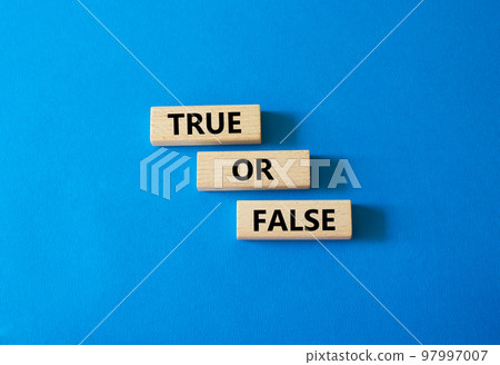 True or false symbol. Wooden blocks with words True or false. Beautiful white background. Businessman hand. Business concept and True or false. Copy space. True or false symbol. Wooden blocks with words True or false. Beautiful white background. Businessman hand. Business concept and True or false. Copy space. 97997007