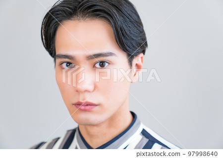 Fashion portrait of a cool man, young, fresh, make-up, permanent make-up, Korean trend 97998640