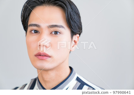 Fashion portrait of a cool man, young, fresh, make-up, permanent make-up, Korean trend 97998641