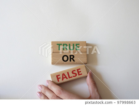 True or false symbol. Wooden blocks with words True or false. Beautiful white background. Businessman hand. Businessman hand. Business concept and True or false. Copy space. True or false symbol. Wooden blocks with words True or false. Beautiful white background. Businessman hand. Businessman hand. Business concept and True or false. Copy space. 97998663