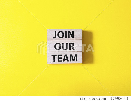 Join our team symbol. Wooden blocks with words Join our team. Beautiful yellow background. Business and Join our team concept. Copy space. Join our team symbol. Wooden blocks with words Join our team. Beautiful yellow background. Business and Join our team concept. Copy space. 97998693