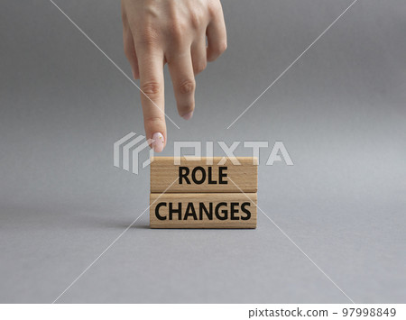 Role changes symbol. Concept words Role changes on wooden blocks. Beautiful grey background. Businessman hand. Business and Role changes concept. Copy space. Role changes symbol. Concept words Role changes on wooden blocks. Beautiful grey background. Businessman hand. Business and Role changes concept. Copy space. 97998849