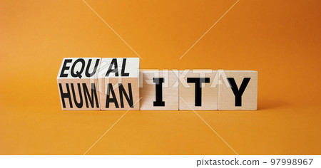 Equality and Humanity symbol. Turned cubes with words Equality and Humanity. Beautiful orange background. Business and Equality and Humanity concept. Copy space Equality and Humanity symbol. Turned cubes with words Equality and Humanity. Beautiful orange background. Business and Equality and Humanity concept. Copy space 97998967